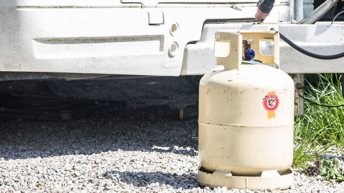 A gas cylinder in front of a motorhome in France