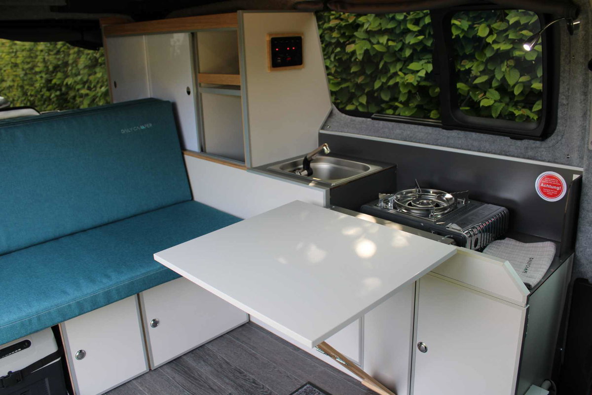 The interior offers complete furnishings including cupboards, sink and kitchen area. © Freizeitmobile KLIEM GmbH &amp;amp; Co.KG