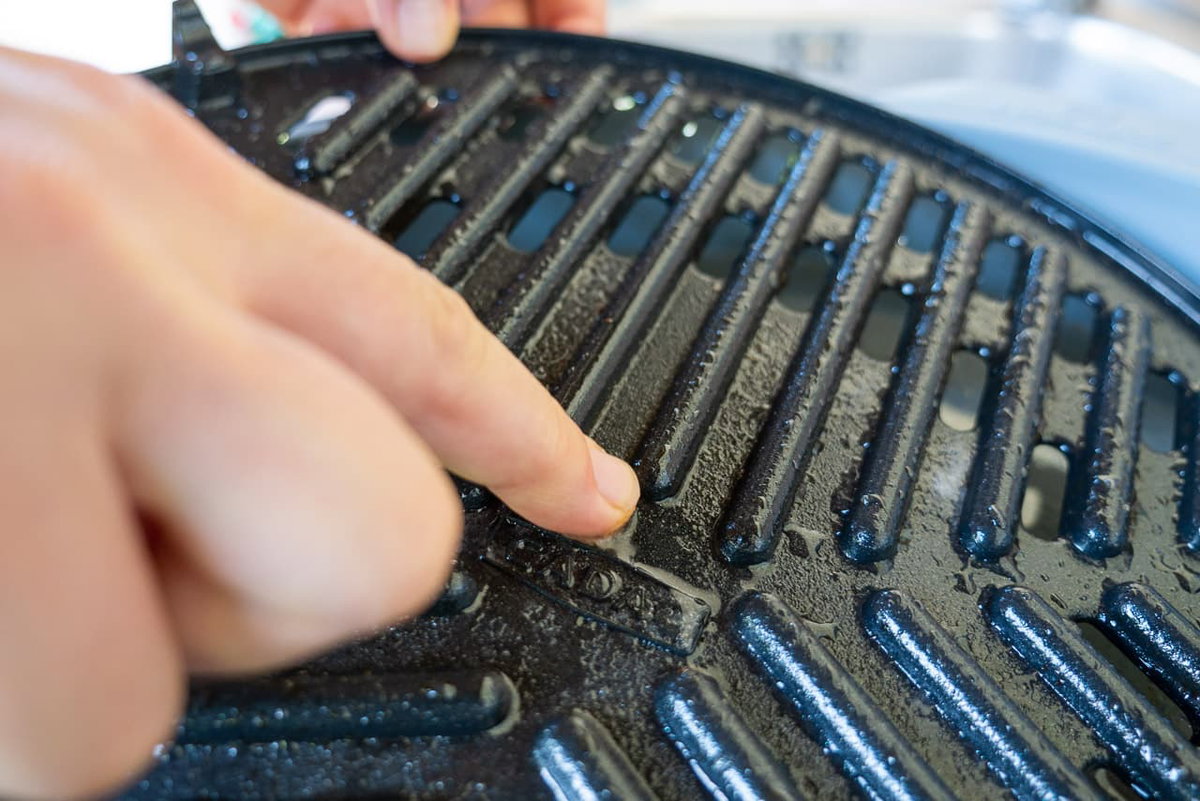 After soaking, the grease loosens on the CADAC grill grate